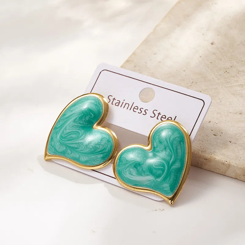 Σκουλαρίκια ατσάλινες τιρκουάζ καρδιές - EA364