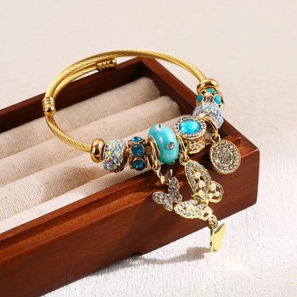 Brățară din oțel auriu cu fluture și talismane-BR488