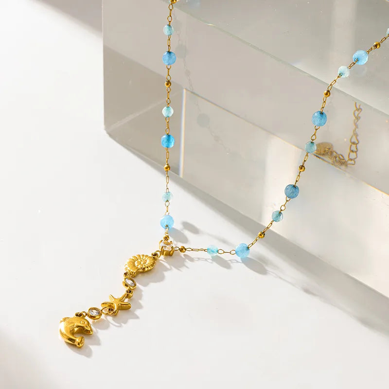 Collier en acier avec perles et pendentifs bleus - NE591