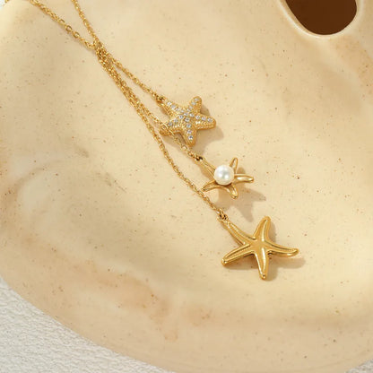 Steel necklace with pink zircon hearts - NE426