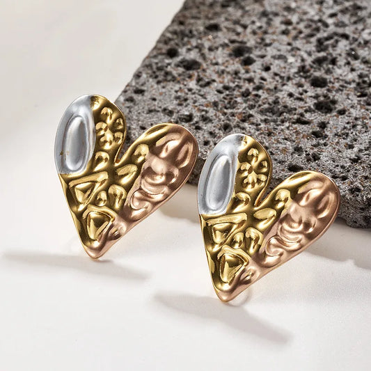 Σκουλαρίκια ατσάλι καρδιές με ασημί-EA097