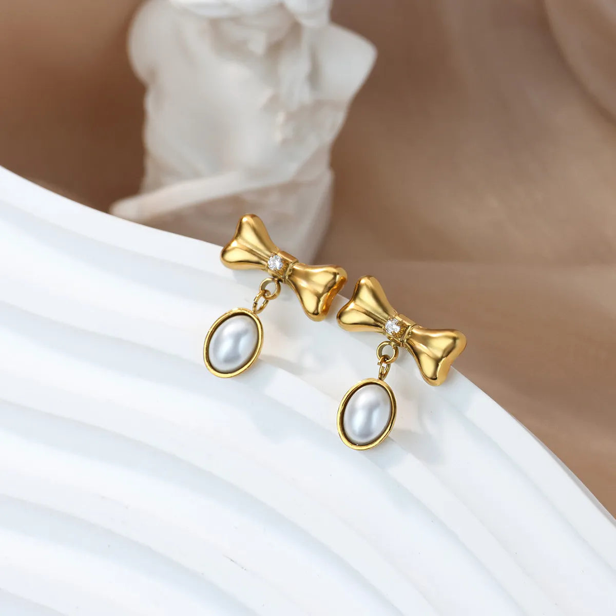 *Σκουλαρίκια ατσάλι φιογκάκια με στρας-EA651