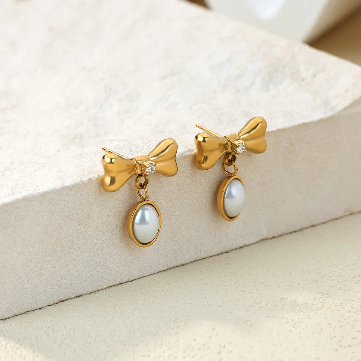 *Σκουλαρίκια ατσάλι φιογκάκια με στρας-EA651