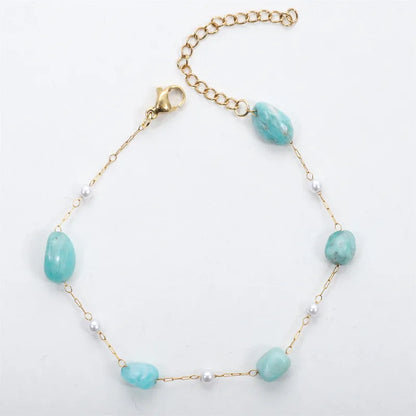 Steel bracelet with light blue stones and pearls - BR434