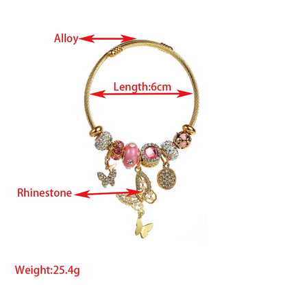 Βραχιόλι χρυσό ατσάλι και κράμα με πεταλούδες και ροζ στοιχεία-BR132