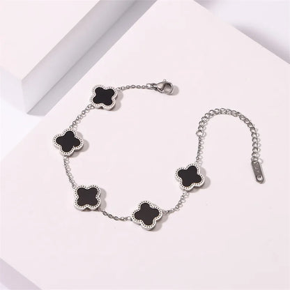 Bracelet silver steel with black round crosses-br065