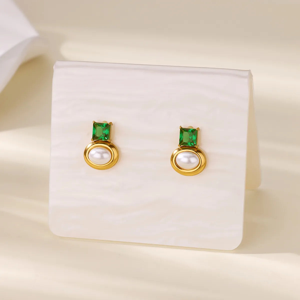 Earrings gold steel with oval pearl and green zircon-ea281