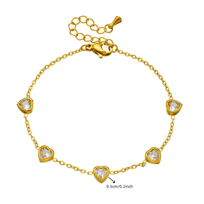 Pulseira em aço dourado com corações de cristal-BR169