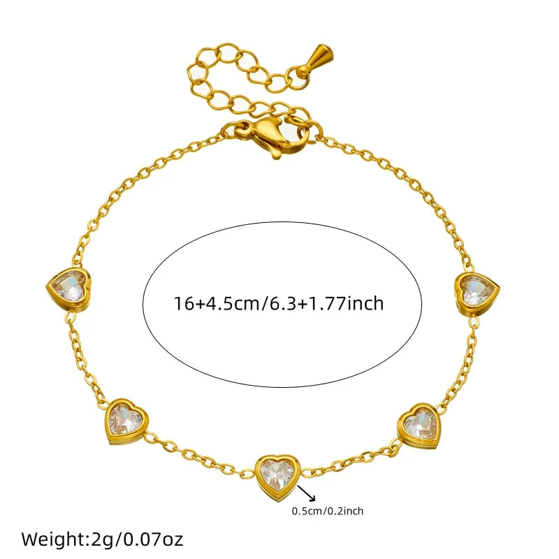 Pulseira em aço dourado com corações de cristal-BR169