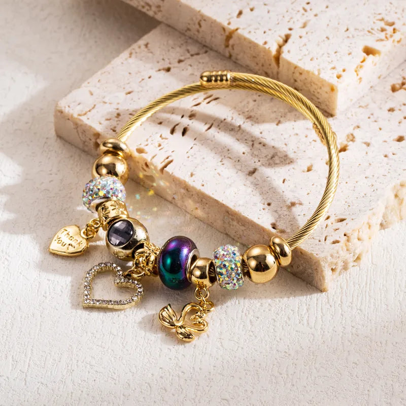 Bratara din otel placat cu aur cu strasuri si brelocuri-BR095