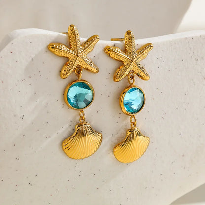 Σκουλαρίκια επιχρυσωμένο ατσάλι με γαλάζιο zircon - EA793