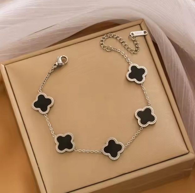 Bracelet silver steel with black round crosses-br065