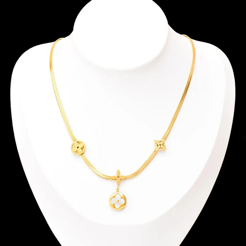 Gold steel necklace with four leaf clover -NE343