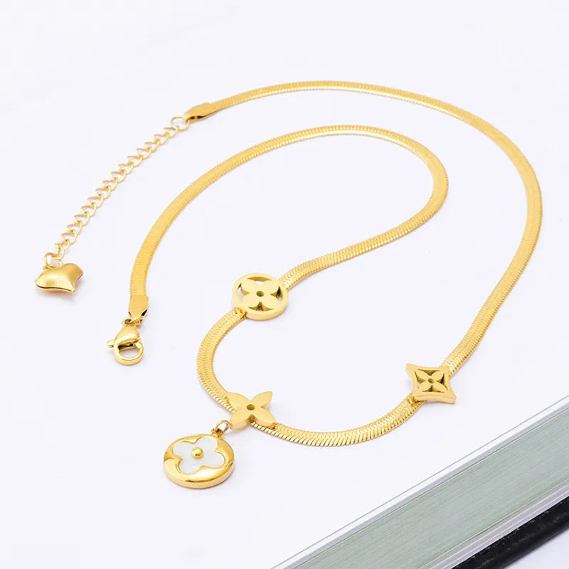 Gold steel necklace with four leaf clover -NE343