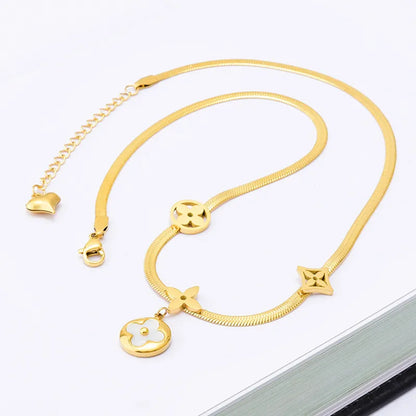 Gold steel necklace with four leaf clover -NE343