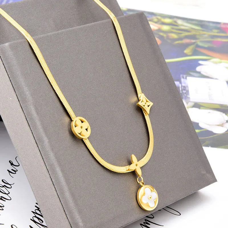 Gold steel necklace with four leaf clover -NE343