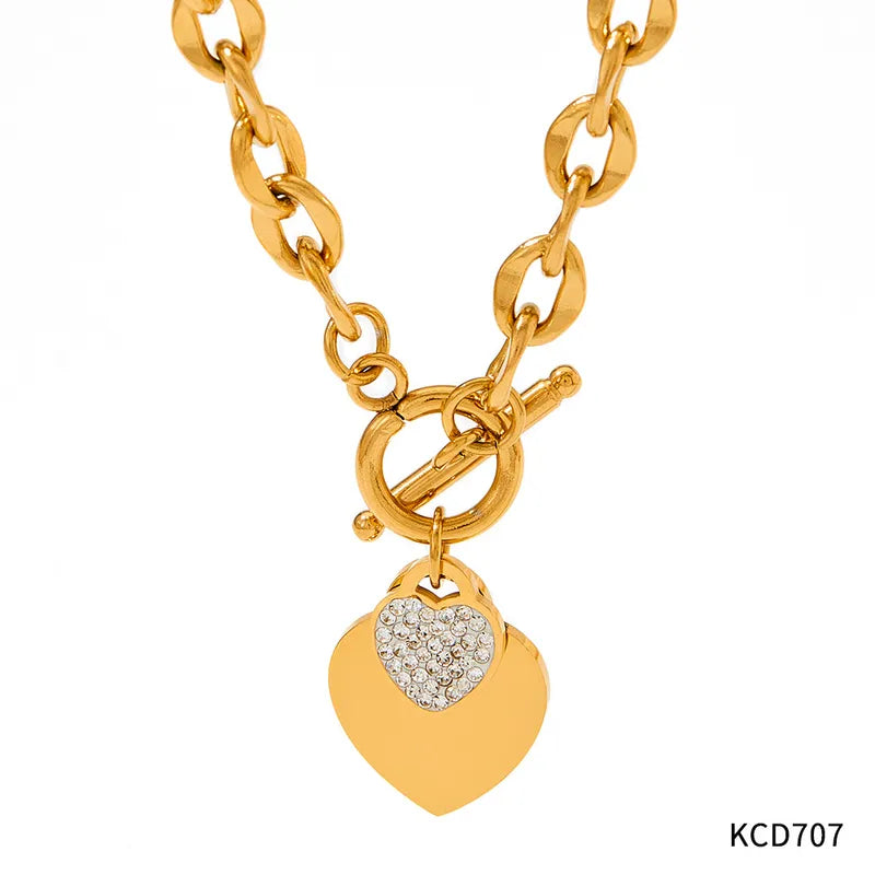Ampia collana in acciaio dorato con zircone e cuore-NE395