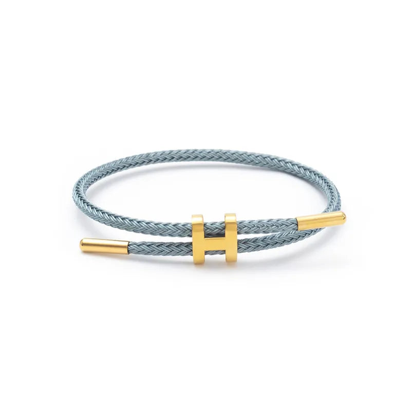 Rope bracelet and steel design in different colors - Br025