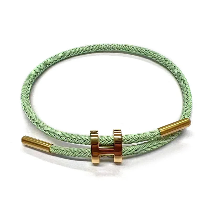 Rope bracelet and steel design in different colors - Br025