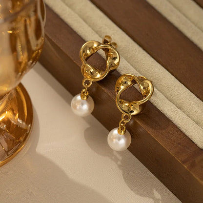 Σκουλαρίκια ατσάλι με κρεμαστή πέρλα-EA407