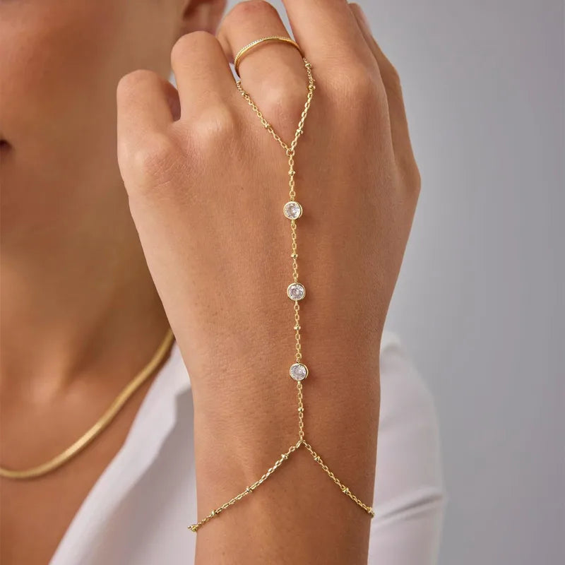 Βραχιόλι επιχρυσωμένο ατσάλι με λευκά zircon - BR428