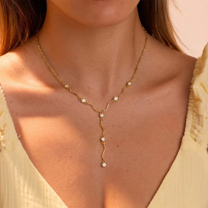 Steel necklace with pink zircon hearts - NE426