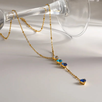 Steel necklace with blue zircon hearts - NE193