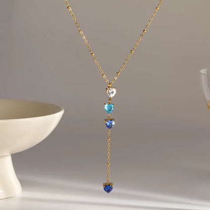 Steel necklace with blue zircon hearts - NE193