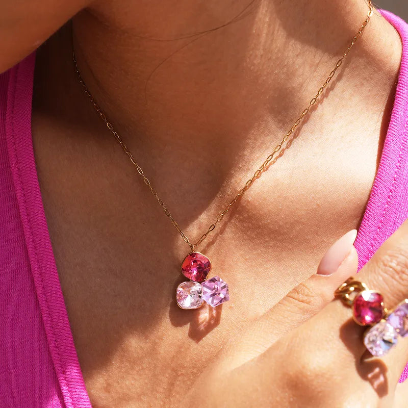 Collana in acciaio dorato con zirconi blu - NE713
