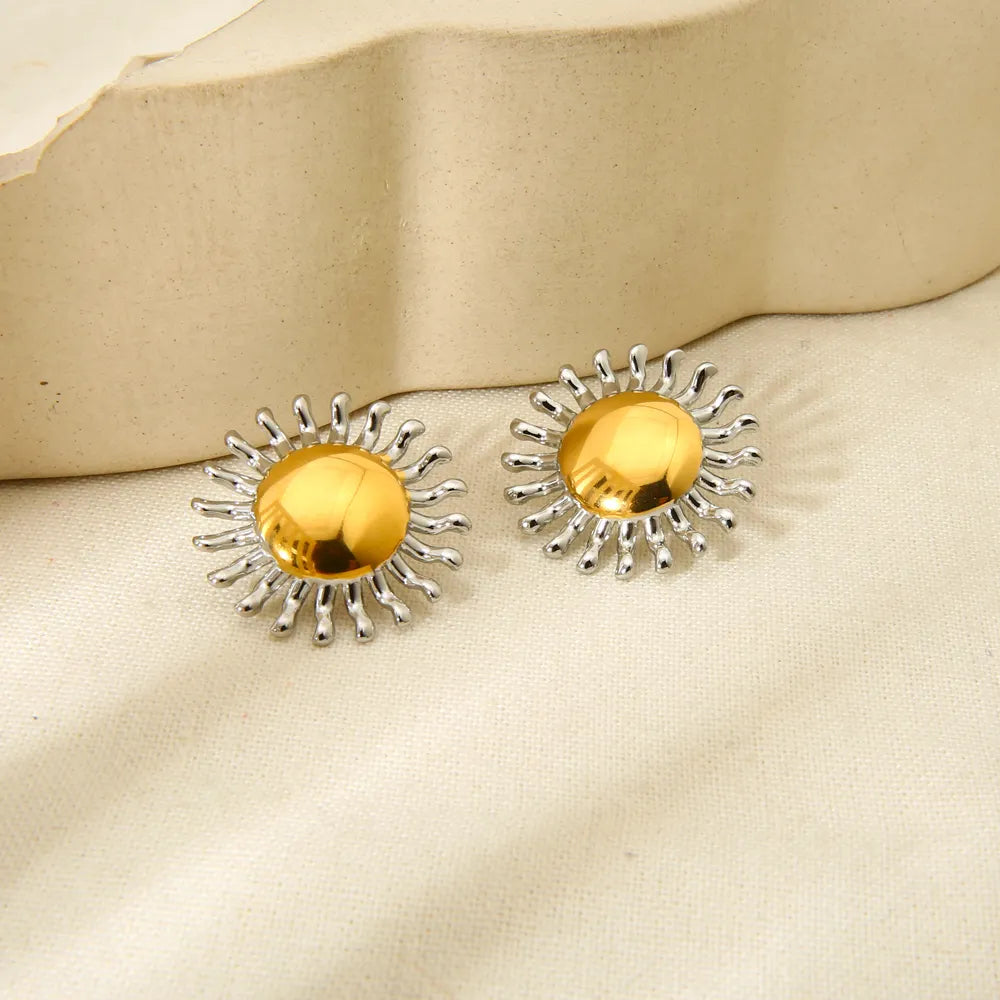 Earrings gilded steel sun with silver rays-