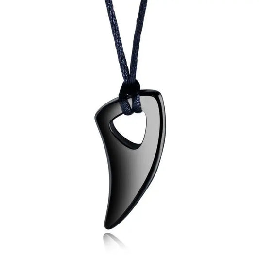 Necklace with a leather cord and steel black pendant tooth - ne349