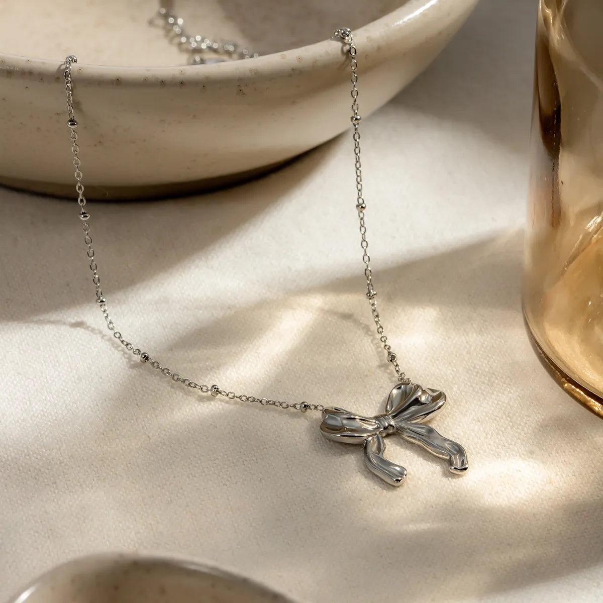 Steel necklace with bow - w299