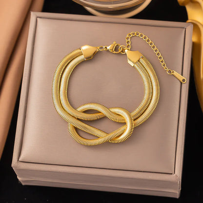 Bracelet flat chain gold-plated steel in knot-br154