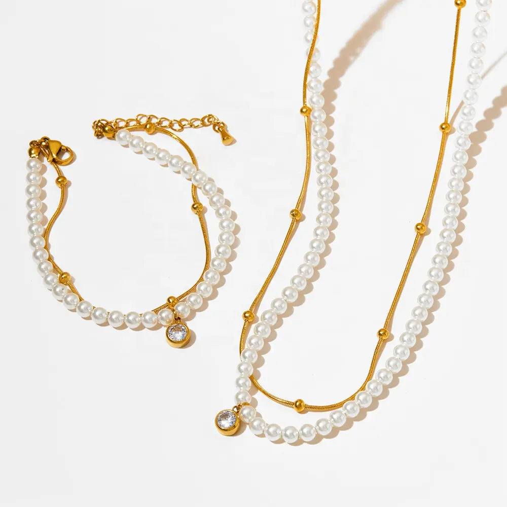 Steel necklace with gold chain pearls and zircon-ne071