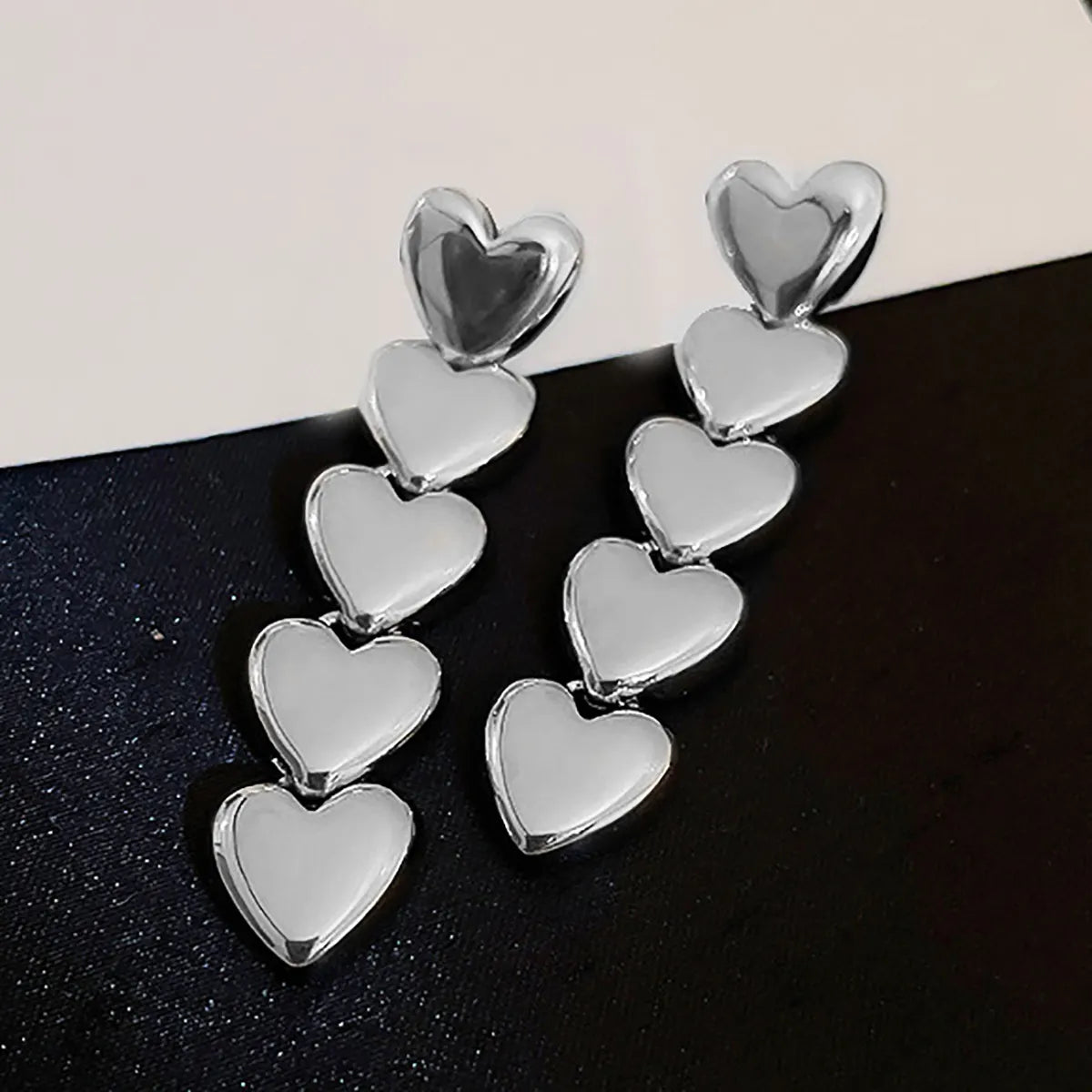 Brass long earring with hearts - w156