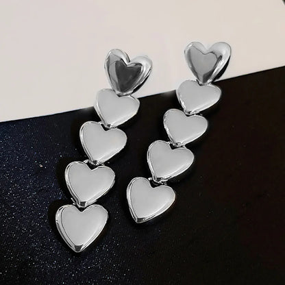 Brass long earring with hearts - w156