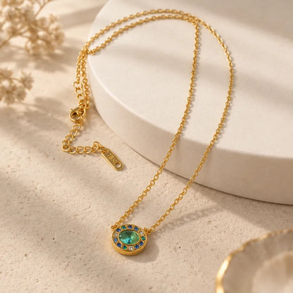 Collana fiore in acciaio con pietre verdi - NE672