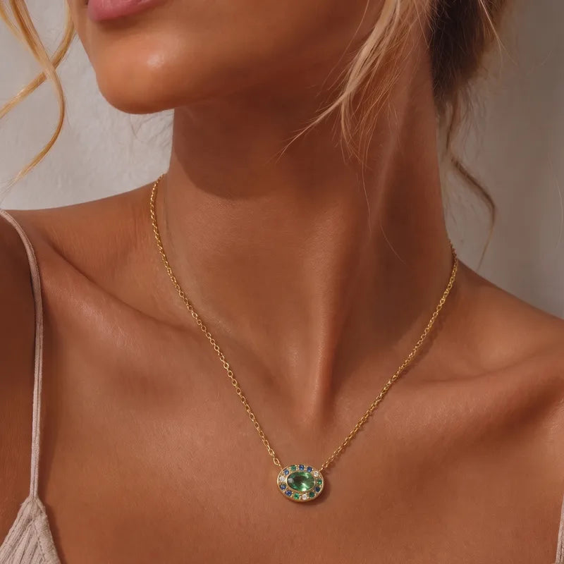 Collana fiore in acciaio con pietre verdi - NE672