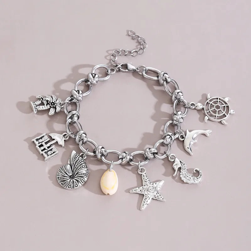 Βραχιόλι ατσάλινο ασημί με κρεμαστά - br380