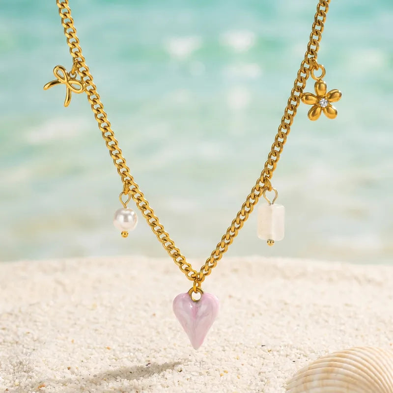 Κολιέ με ροζ καρδιά και charms - NE685