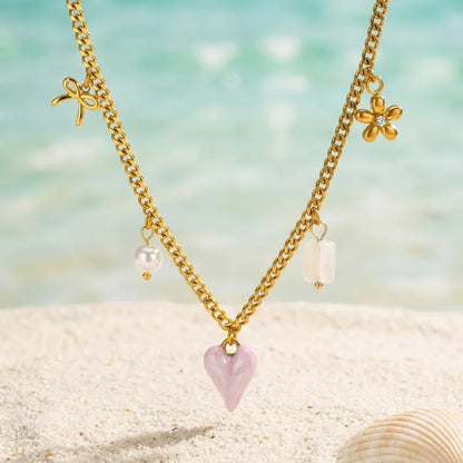 Κολιέ με ροζ καρδιά και charms - NE685