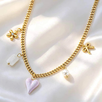 Κολιέ με ροζ καρδιά και charms - NE685