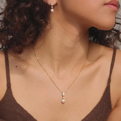 Pendientes collar de acero bañado en oro engastados con resina verde - SET039