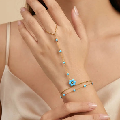 Steel bracelet with white flowers - BR255