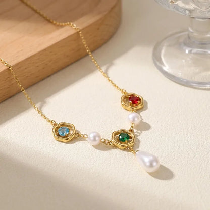 Steel necklace with pearls and colorful rhinestones - NE442
