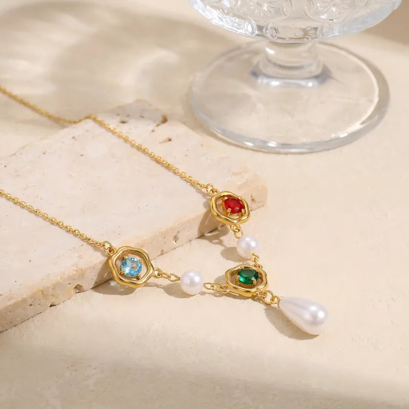 Steel necklace with pearls and colorful rhinestones - NE442