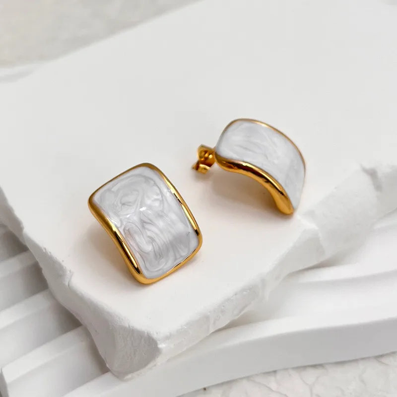 Σκουλαρίκια επιχρυσωμένο ατσάλι λευκά με καμπύλη-EA437