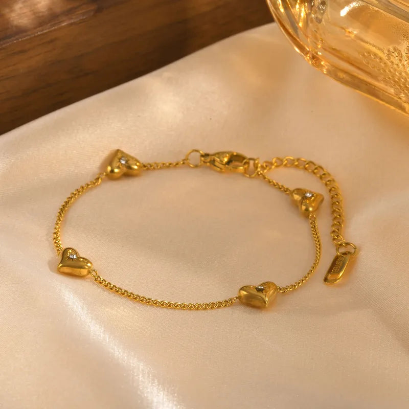 Gold-plated steel bracelet with hearts and zircon-BR013