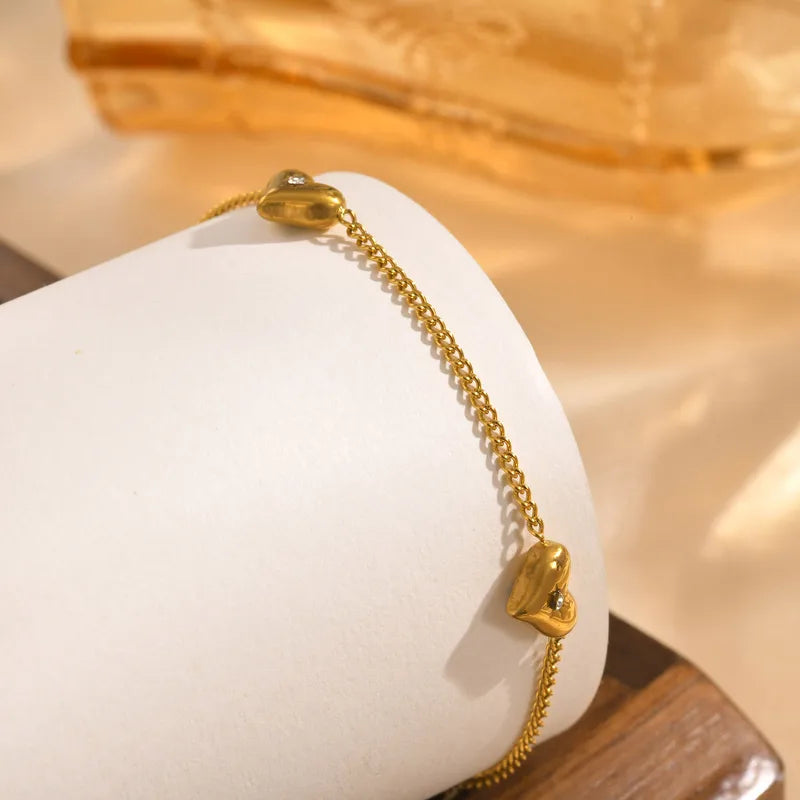 Gold-plated steel bracelet with hearts and zircon-BR013