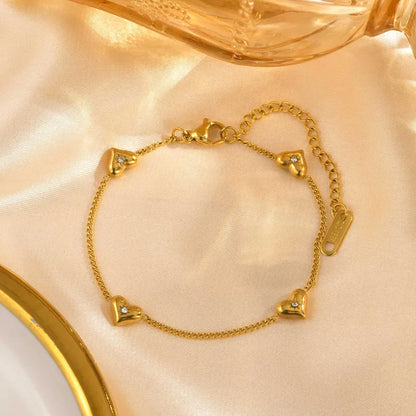 Gold-plated steel bracelet with hearts and zircon-BR013